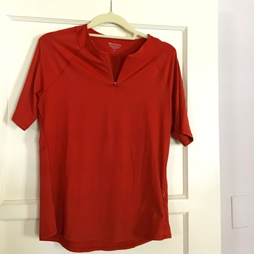 Athleta top with 4 inch zipper in a redwood color
